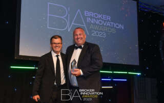 Jon Newall collects the Start Up of the Year award at the Broker Innovation Awards