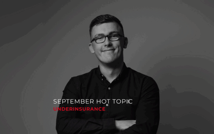 A black and white image of Callum with the writing "September Hot Topic" in white and "Underinsurance" in red.